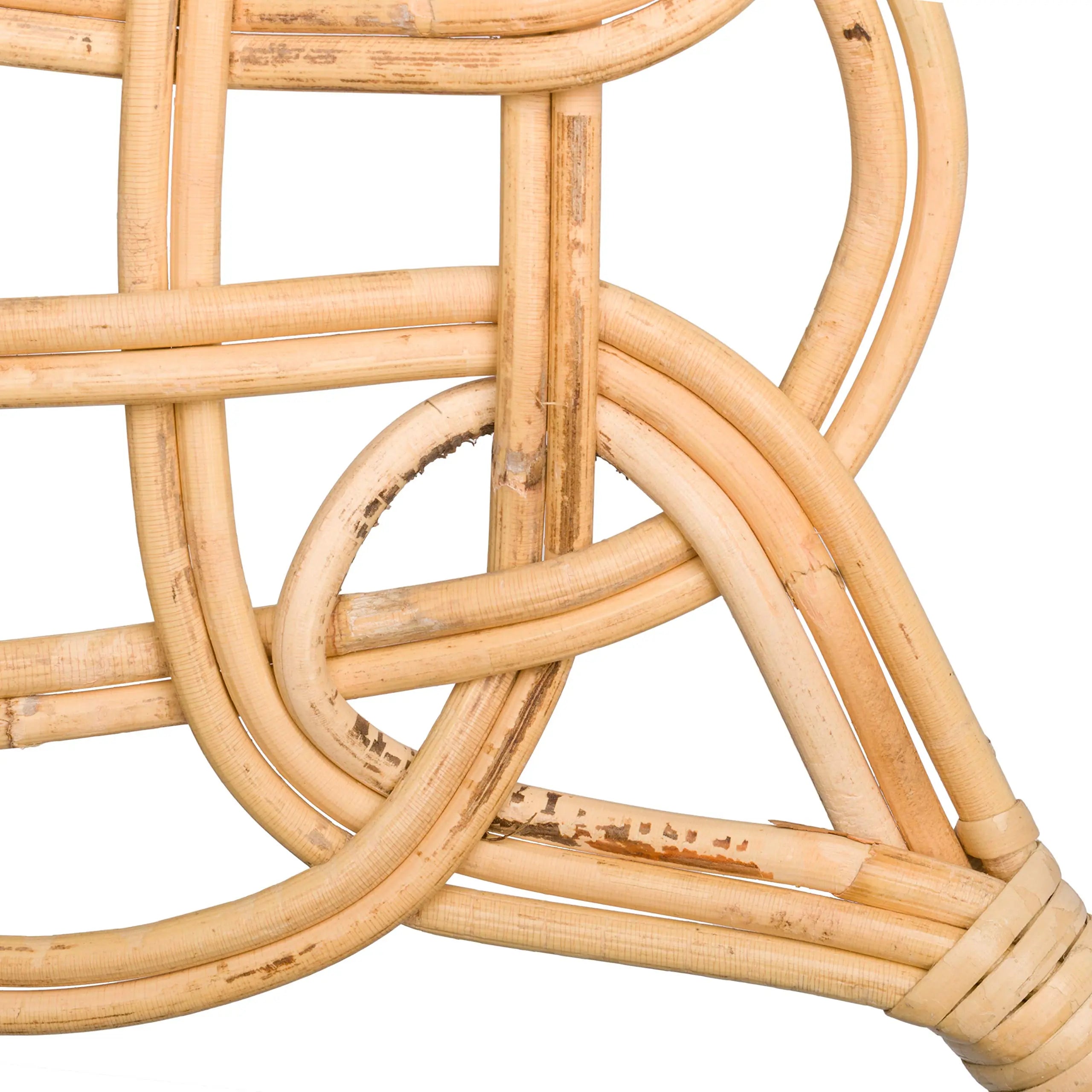 Traditional Redecker Carpet Beater in natural rattan reed for effective carpet cleaning.
