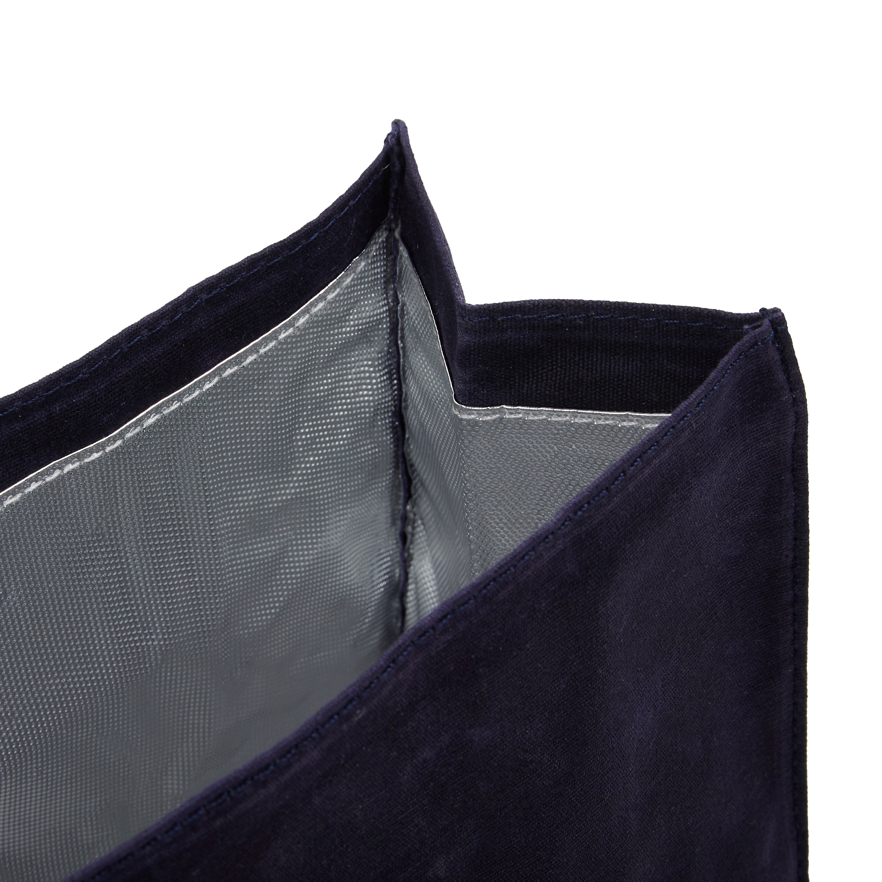 Navy thermal lunch bag styled in store